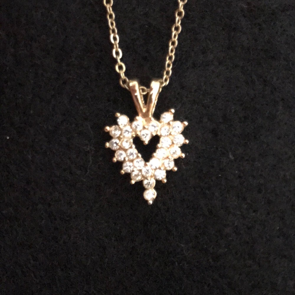 gold heart necklace with inset stones